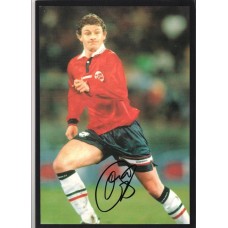 Signed picture of Ole Gunnar Solskjaer in his Norway international strip.